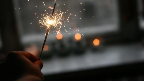 A sparkler burning to celebrate the new year